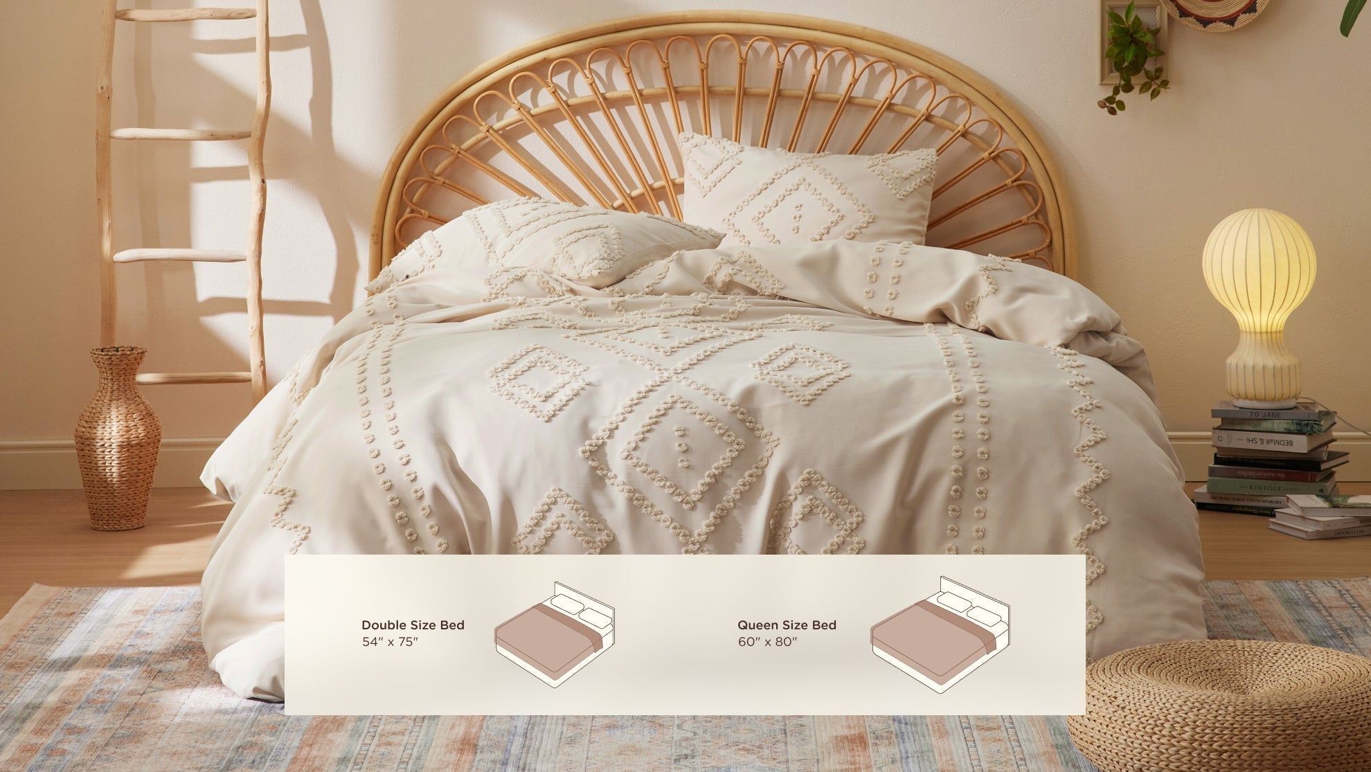 Queen size bed with tufted cream duvet and natural rattan headboard in bright bedroom