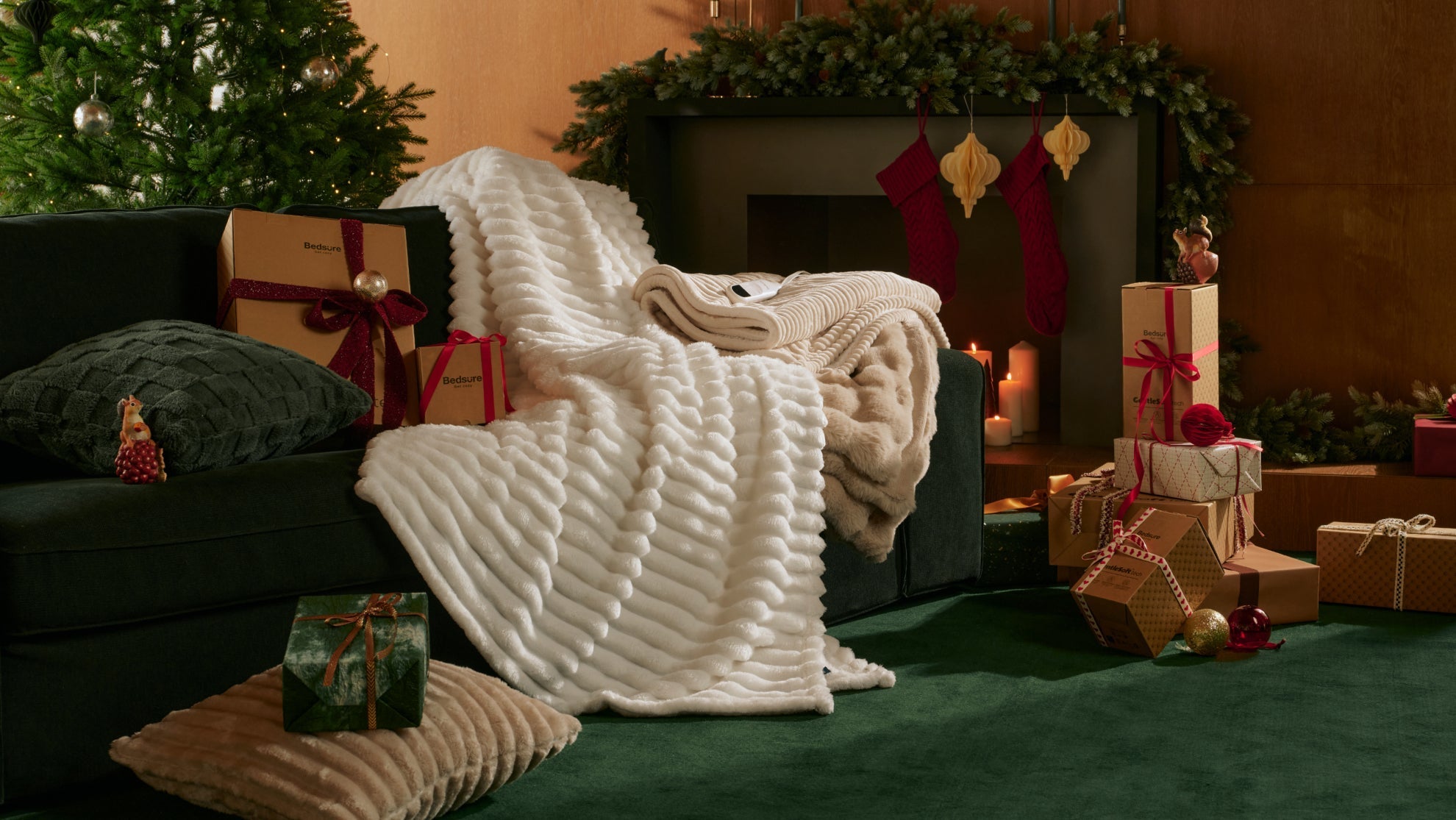 Cozy Christmas living room with Bedsure faux fur blanket, pillows and gift boxes creating warm winter bedroom vibe