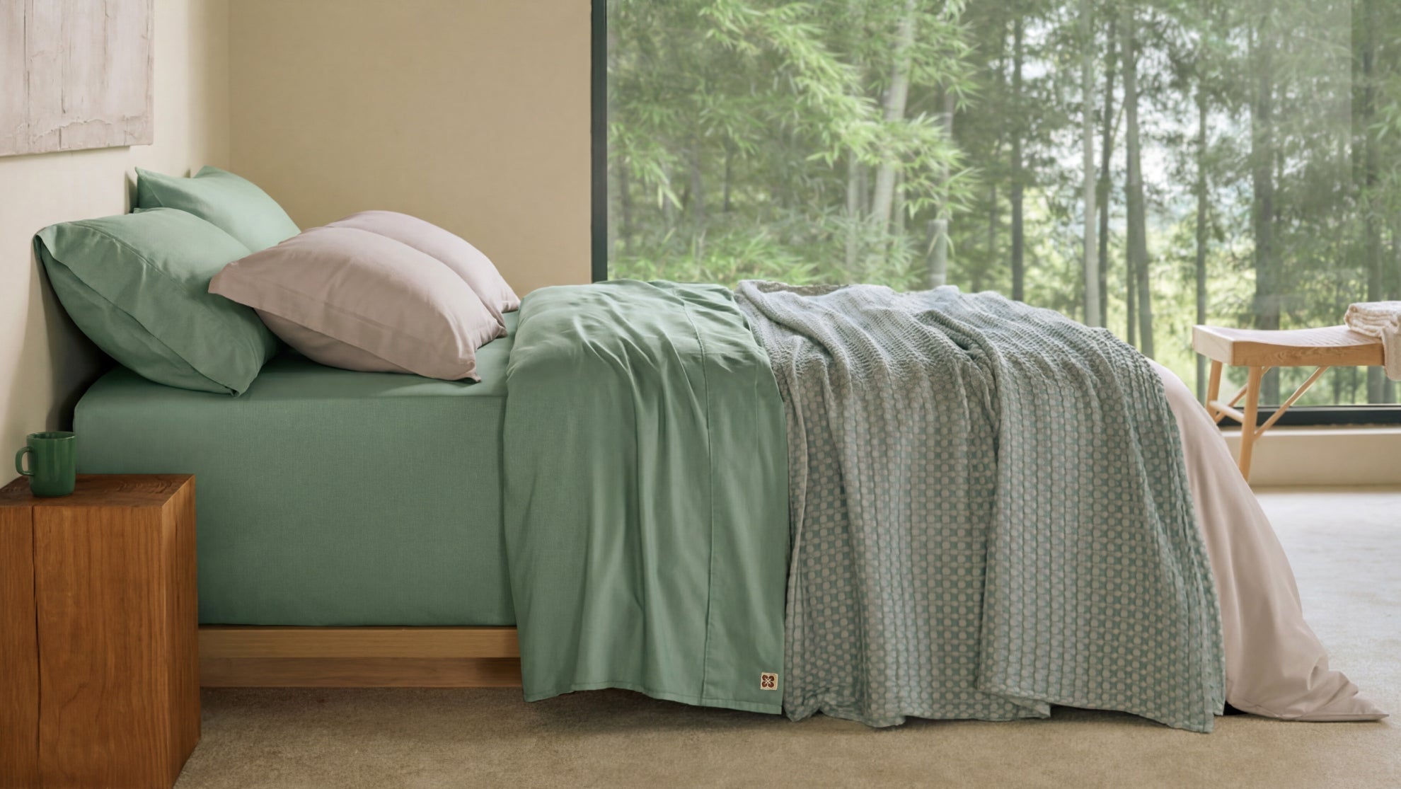 A serene bedroom featuring a bed dressed in eco-friendly green bamboo sheets and a textured throw, with a large window overlooking a lush bamboo forest, highlighting sustainable bedding.