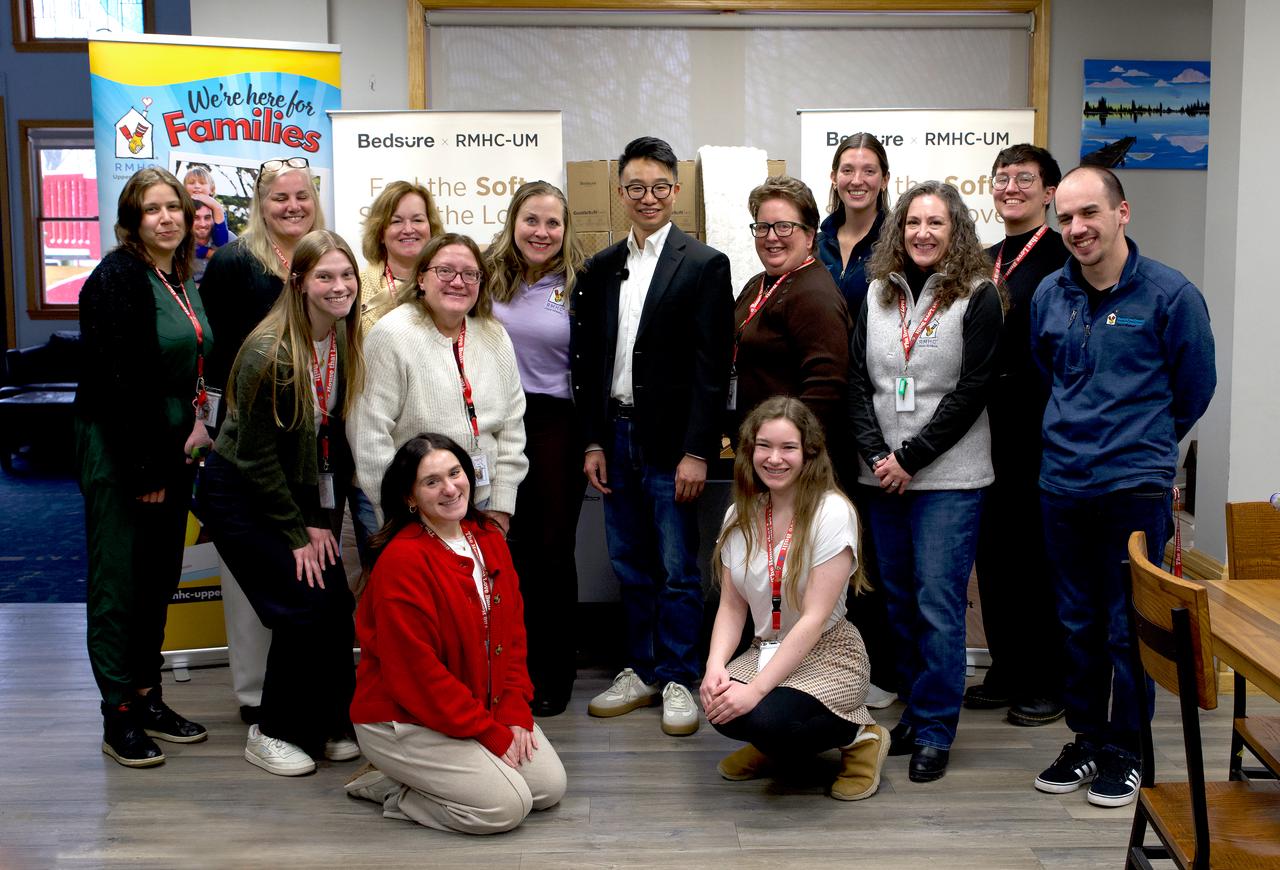A group photo of the Bedsure and RMHC-UM teams celebrating their community partnership at the bedding donation ceremony.