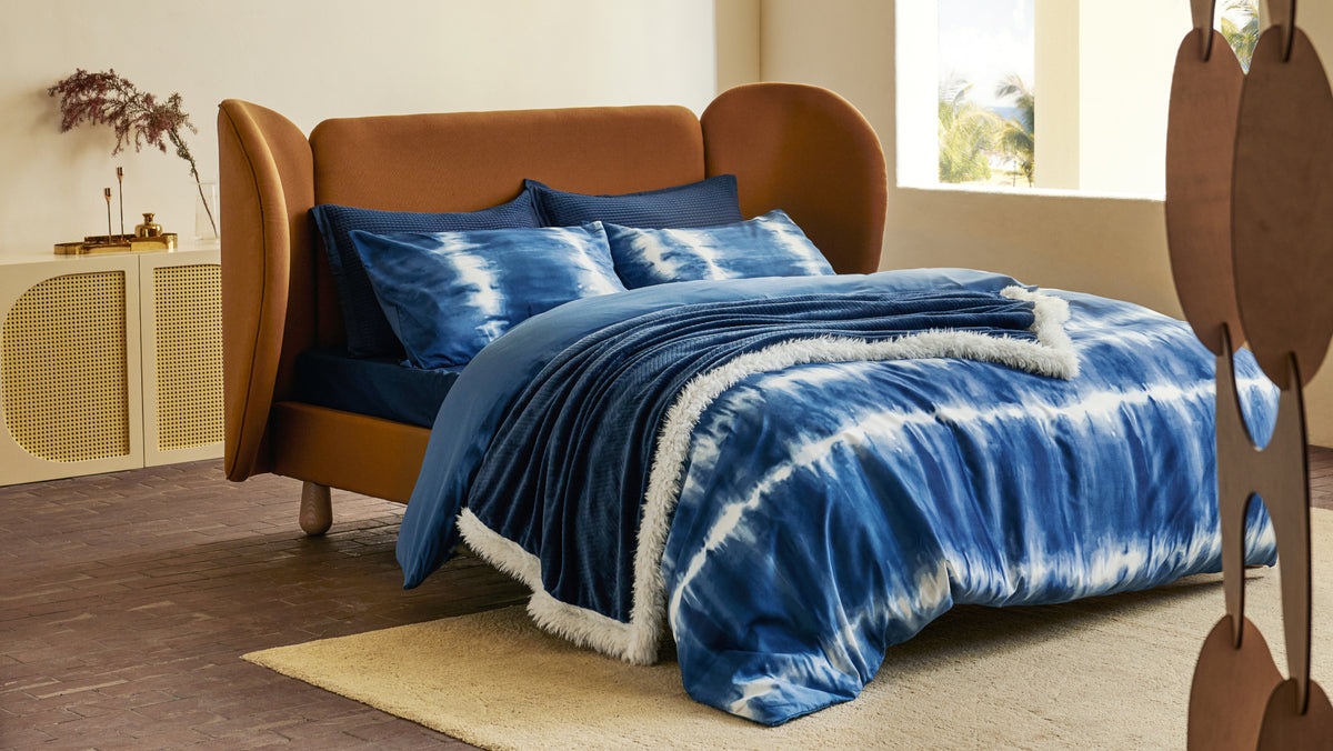Deep Teal and Navy Throws: Reading 2026's Color Shift Without Chasing Trends