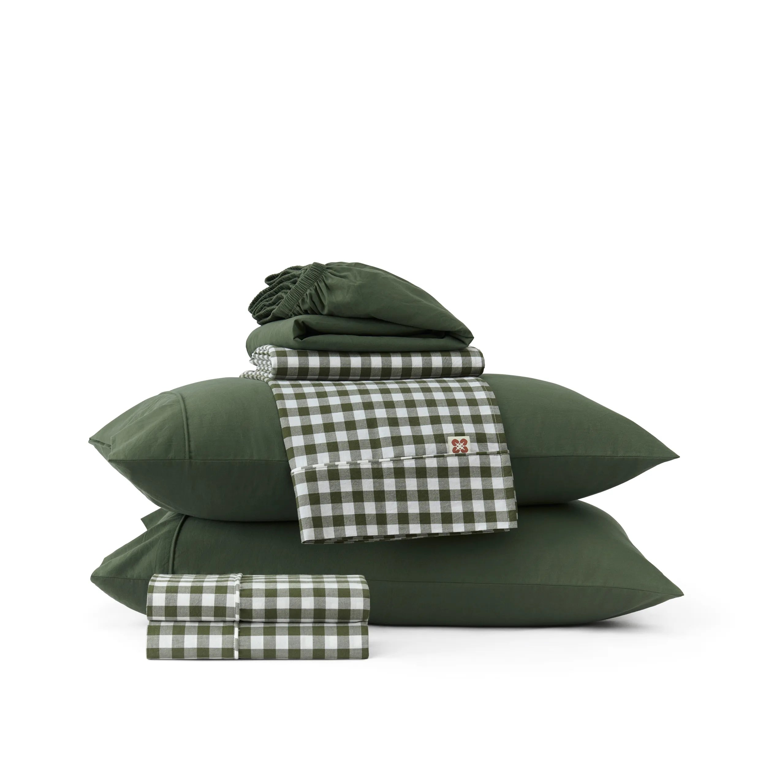 Deep green PureWoven™ 6-piece cotton sheet set with gingham accents.
