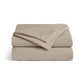 PureWoven™ beige 100% cotton waffle weave duvet cover, folded.