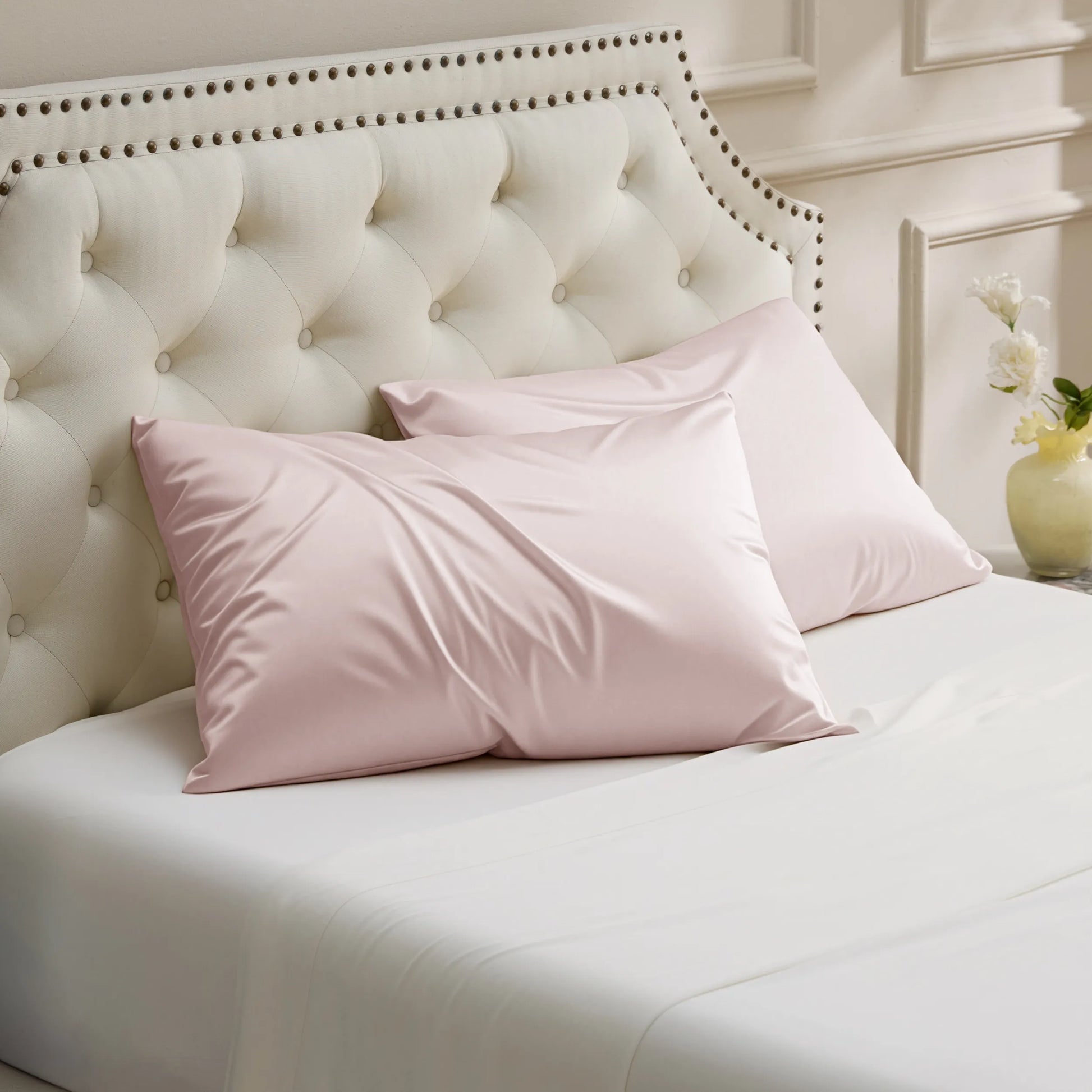 Pink Beauty Sleep Pillowcases: two cooling, silk-soft nylon-spandex pillowcases.