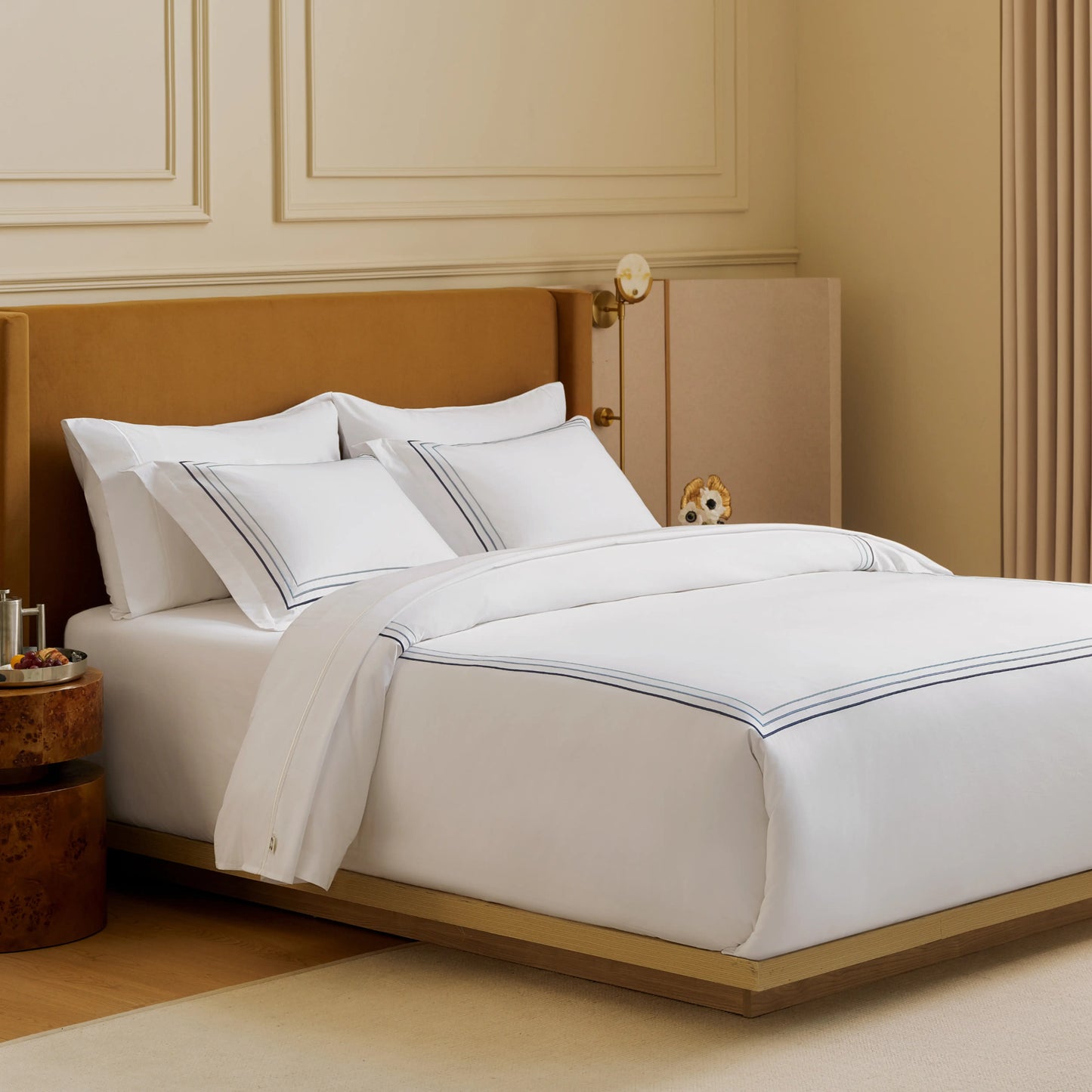 Elegant white PureWoven Giza Egyptian Cotton duvet cover set with double blue line embroidery.