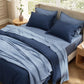 Rayon bamboo bedding set in navy and light blue, with a blue textured waffle blanket.
