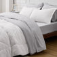 Reversible grey and white quilted microfiber comforter and bedding set