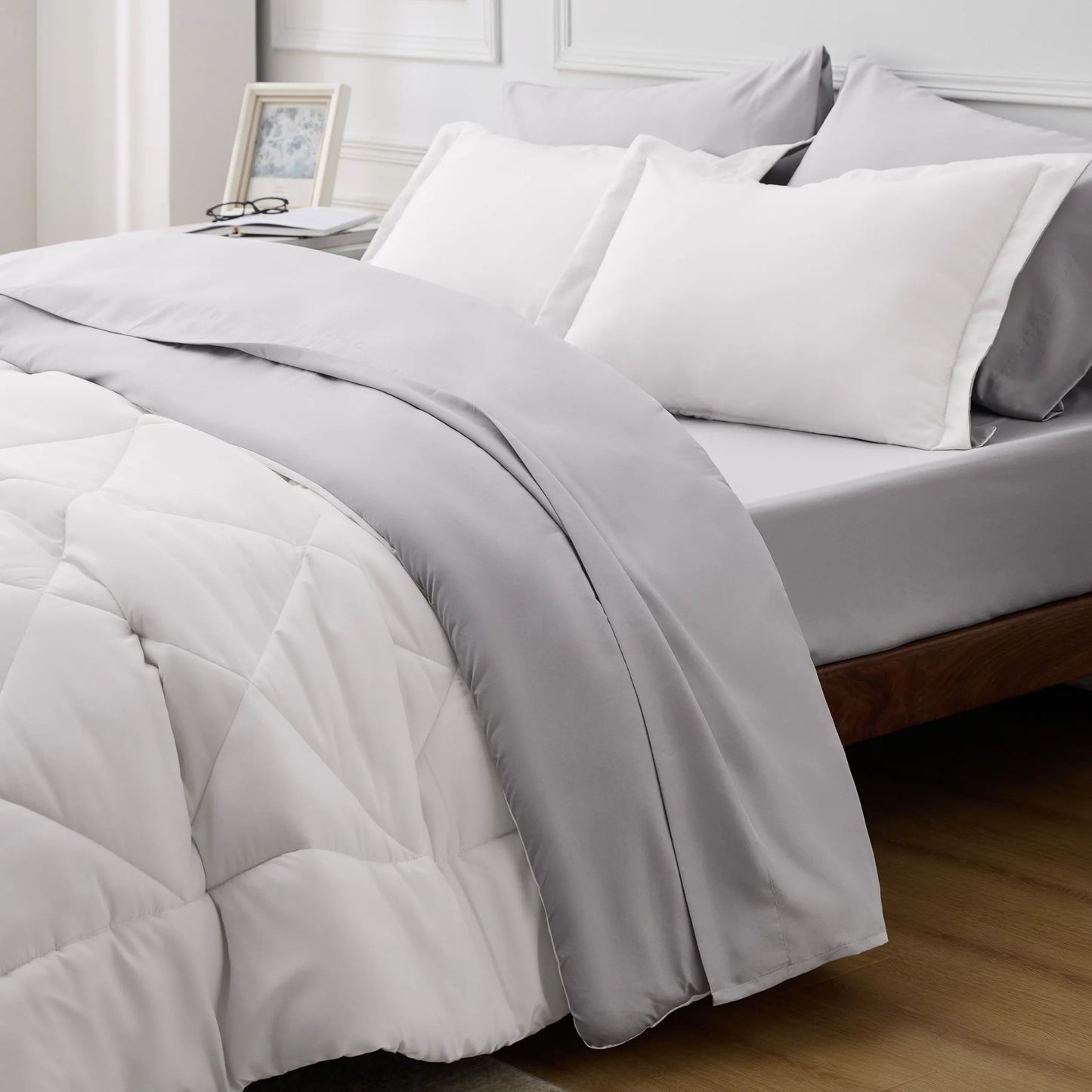 Reversible grey and white quilted microfiber comforter and bedding set