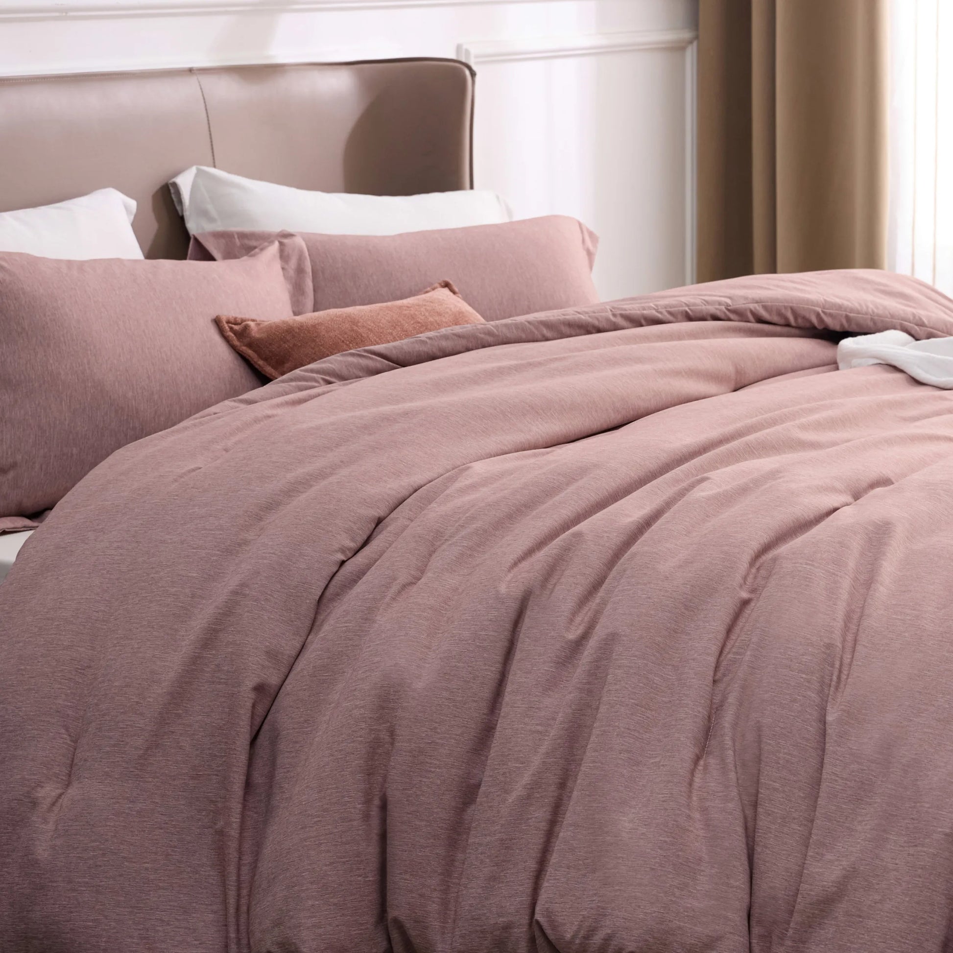Dusty rose cationic dye comforter set with subtle dual-tone texture.