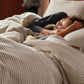 100% cotton waffle weave duvet cover in light beige for cozy sleep.