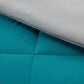 Teal and silver reversible comforter detail showing diamond quilting. Microfiber bedding.