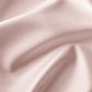 Blush nylon-spandex fabric, silk-like softness and subtle weave for beauty pillowcases.