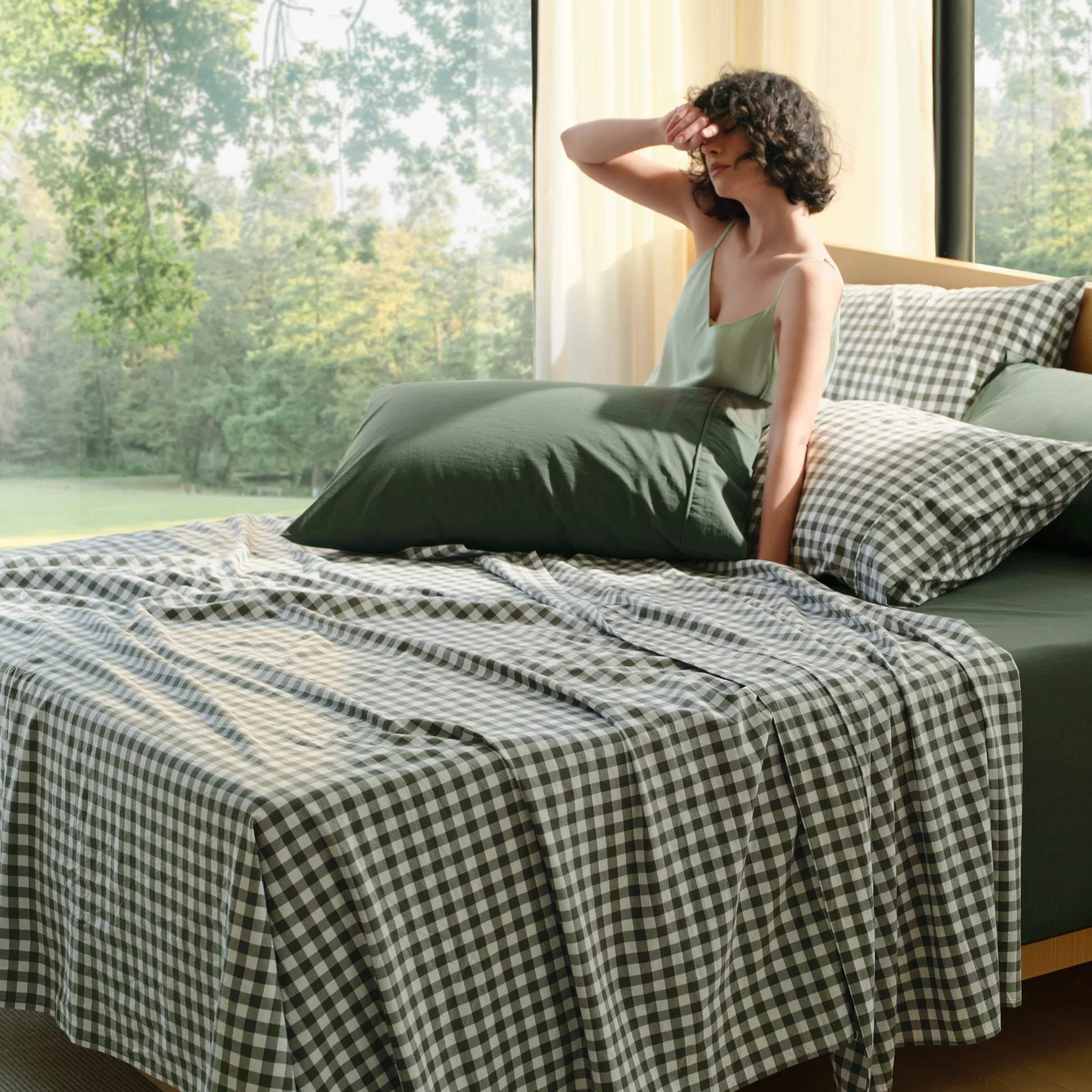 PureWoven™ 6-piece washed cotton sheet set, featuring a soft green gingham pattern.