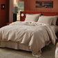 PureWoven™ beige cotton waffle weave duvet cover, showcasing its soft 3D textured surface.