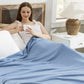 GentleSoft blue 100% cotton herringbone blanket with soft texture.