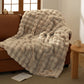 Bedsure luxe plush blanket with ripple texture in warm beige, on sofa.