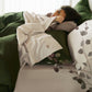PureWoven™ Serene Blend Luxe Bundle: soft bamboo-cotton bedding in green & cream.