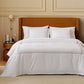 PureWoven Giza Egyptian cotton duvet cover set in white with subtle gold embroidery detail.