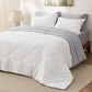 Reversible bed-in-a-bag with white diamond-quilted comforter and grey bedding set.