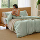 PureWoven sage green & white striped washed cotton duvet cover set with beige throw.