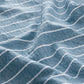 Blue and white striped cotton-like fabric detail for sheet sets