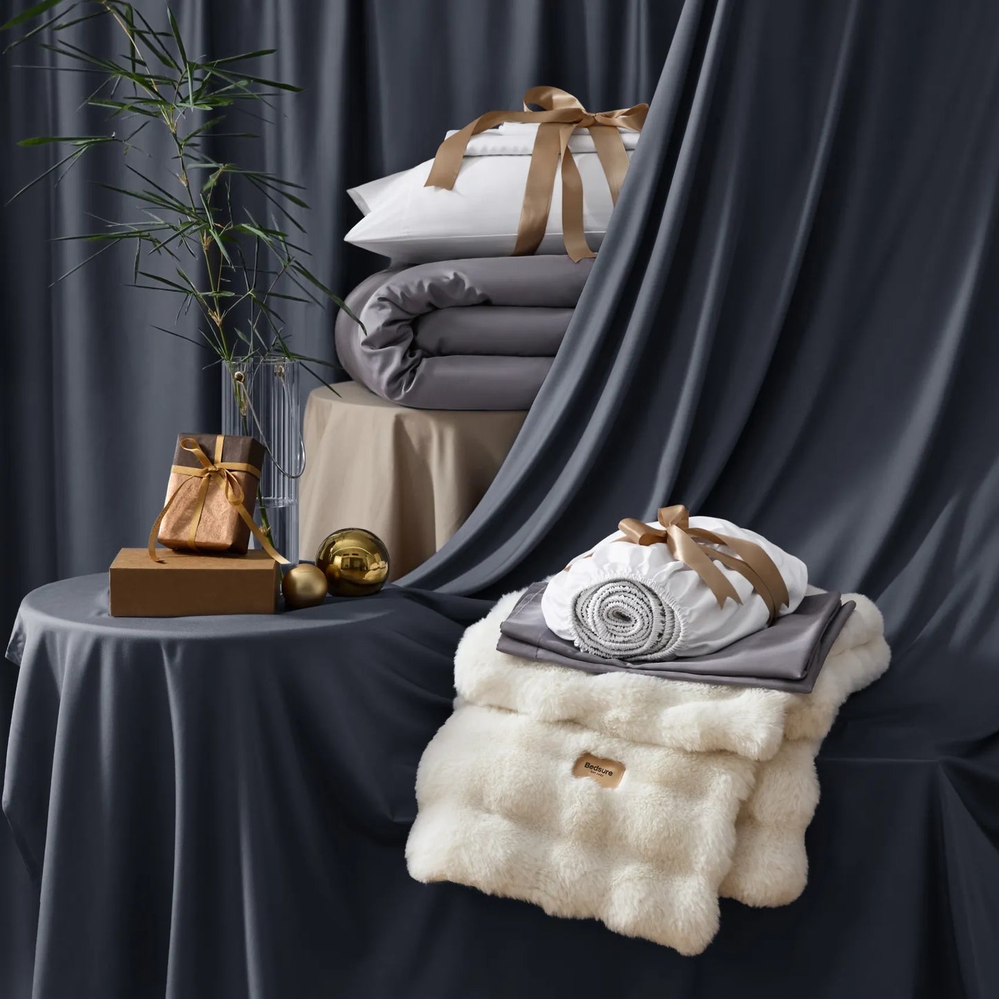 Stacked rayon derived from bamboo luxe bundle: duvet, sheets, and plush blanket.