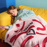 Marilyn Monroe™ Sherpa Blanket Wavy Pink