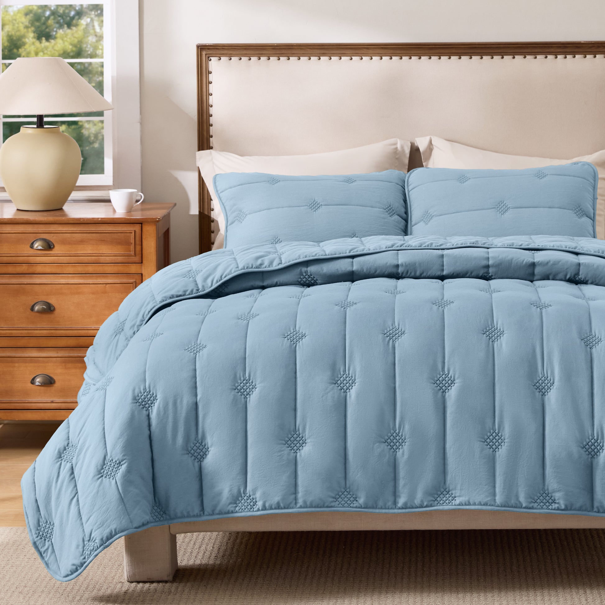 Prewashed blue diamond quilt set with elegant dot stitch pattern.