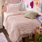 Ruched Bow Comforter Set in soft pink with decorative bow ties and scalloped headboard.