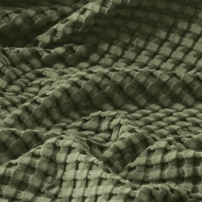 GentleSoft olive green cooling waffle blanket close-up showing bamboo-cotton blend texture and weave.
