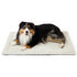 Tri-color dog relaxing on cream ComfyFleece self-warming mat with corduroy fleece texture.