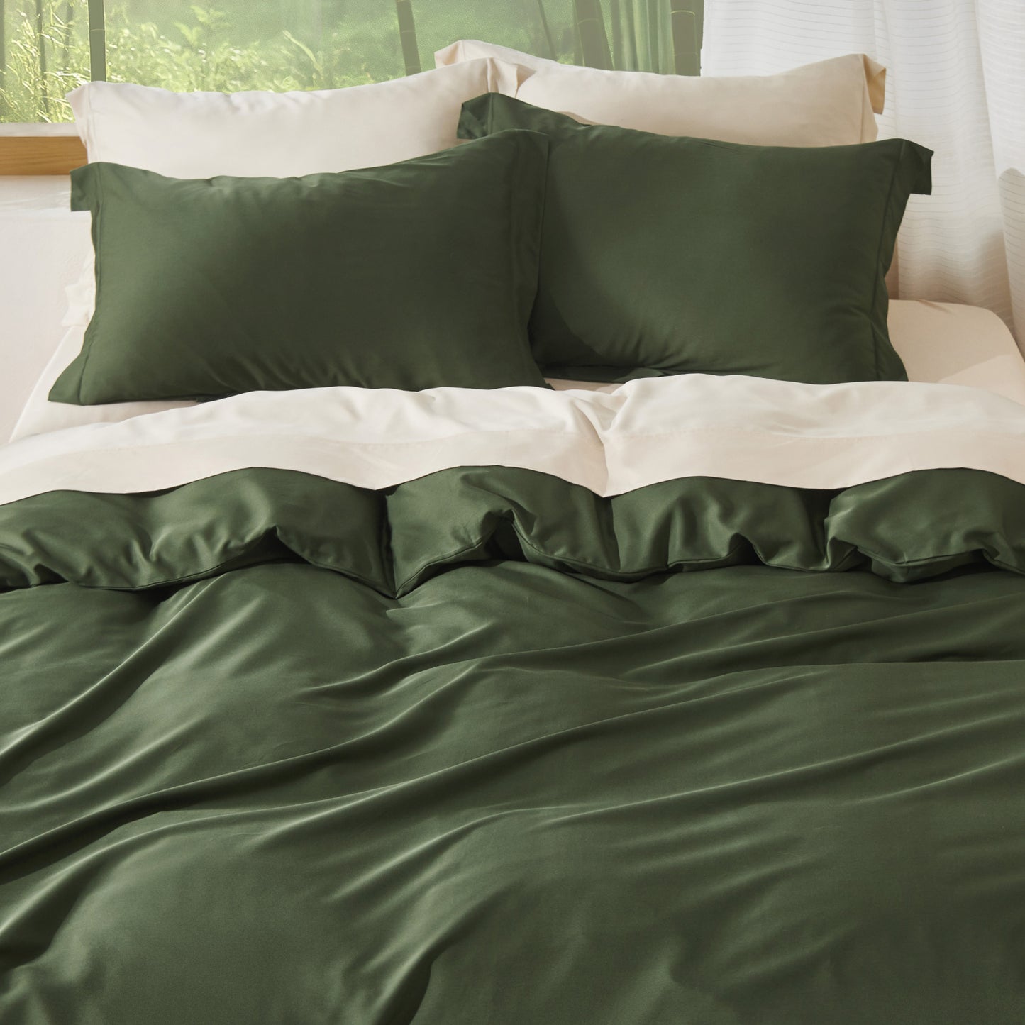 Green rayon derived from bamboo bedding set bundle with silky pillows.