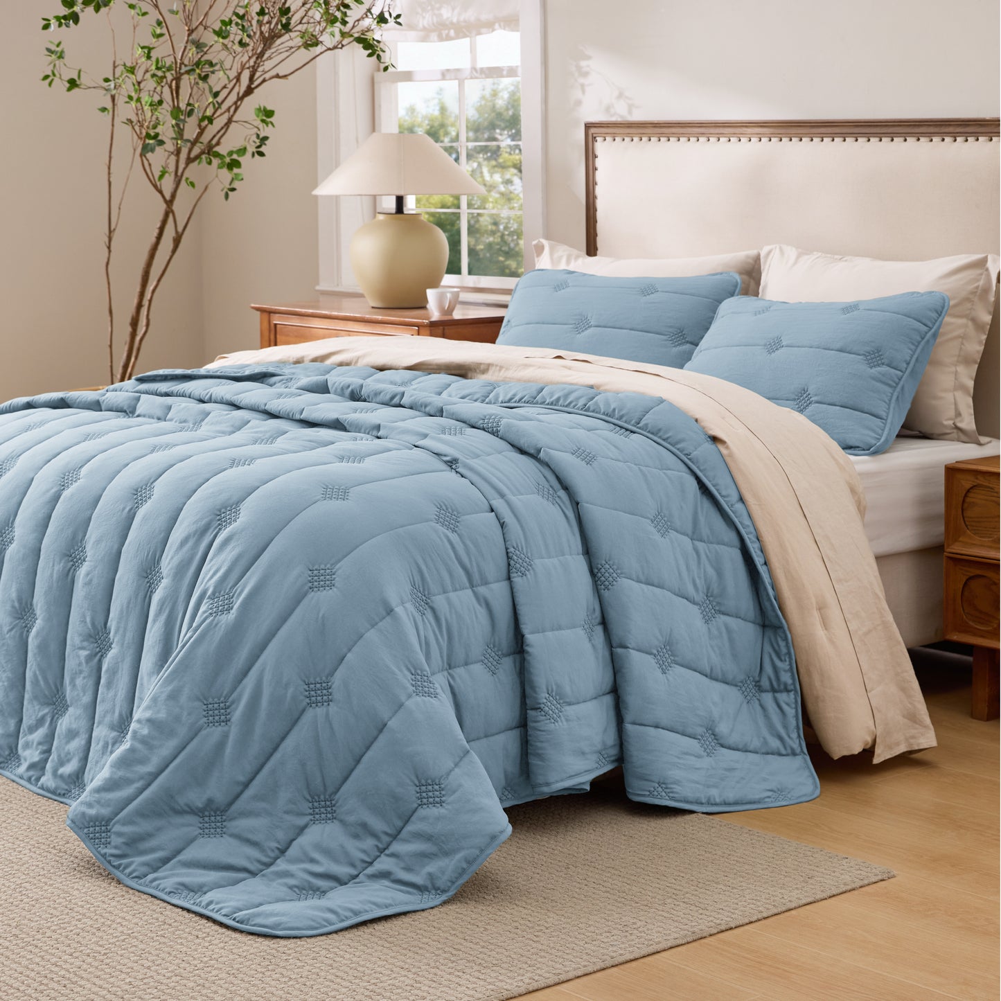 Elegant blue prewashed diamond quilt set with dot stitch design, polyester
