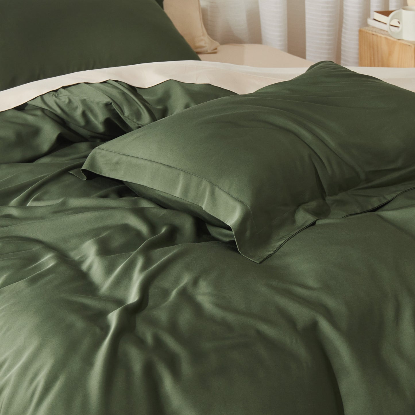 Rayon derived from bamboo bedding bundle in dark green.