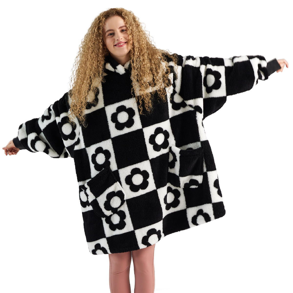 Shaggy Sherpa Blanket Hoodie with black and white checkerboard flower print.