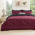 Deep red and black reversible comforter with diamond quilting, part of a bed-in-a-bag set.