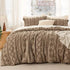 Boho Deluxe taupe comforter set with intricate embroidery and diamond patterns.