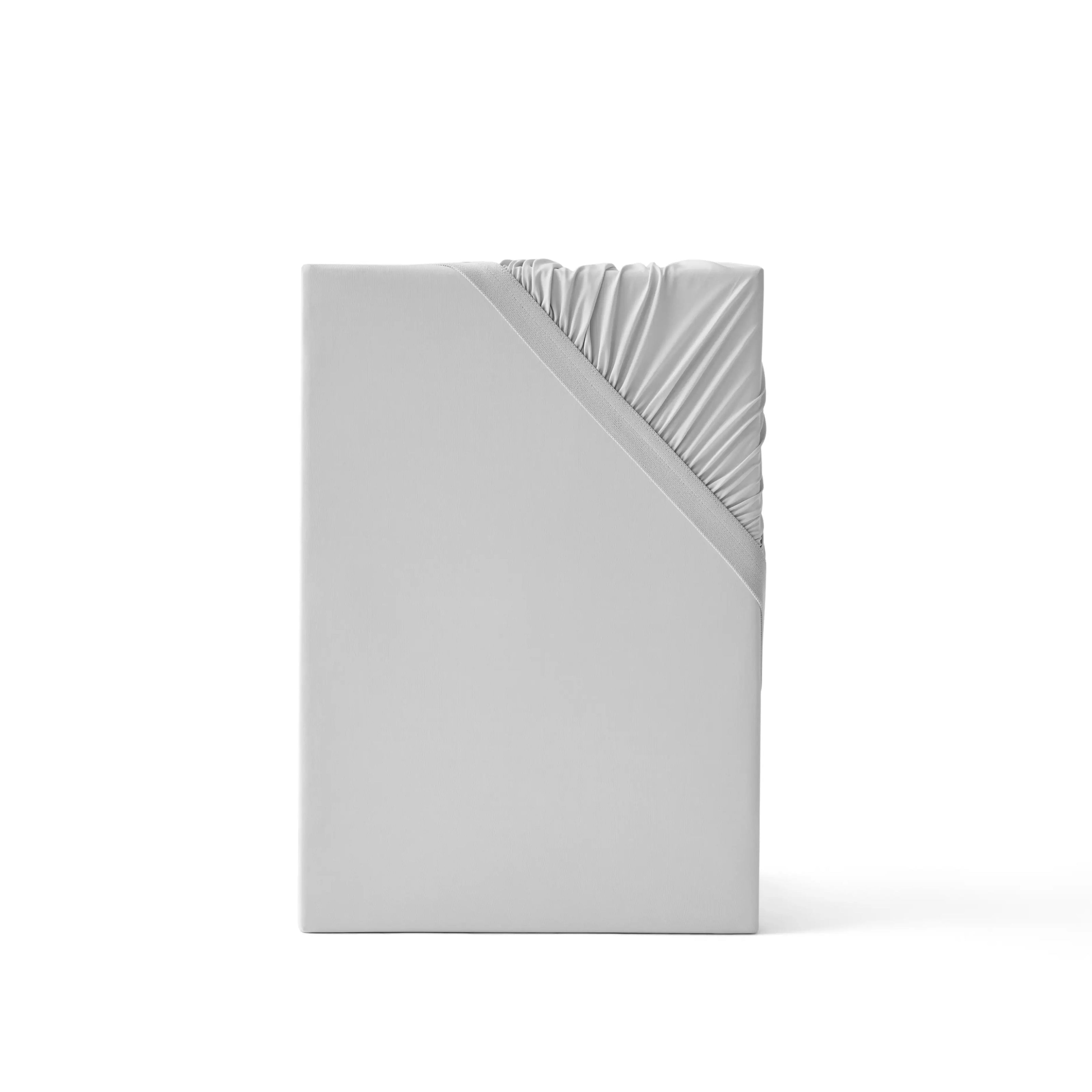 Cooling fitted sheet in light gray, showing elastic edge and smooth cooling fabric