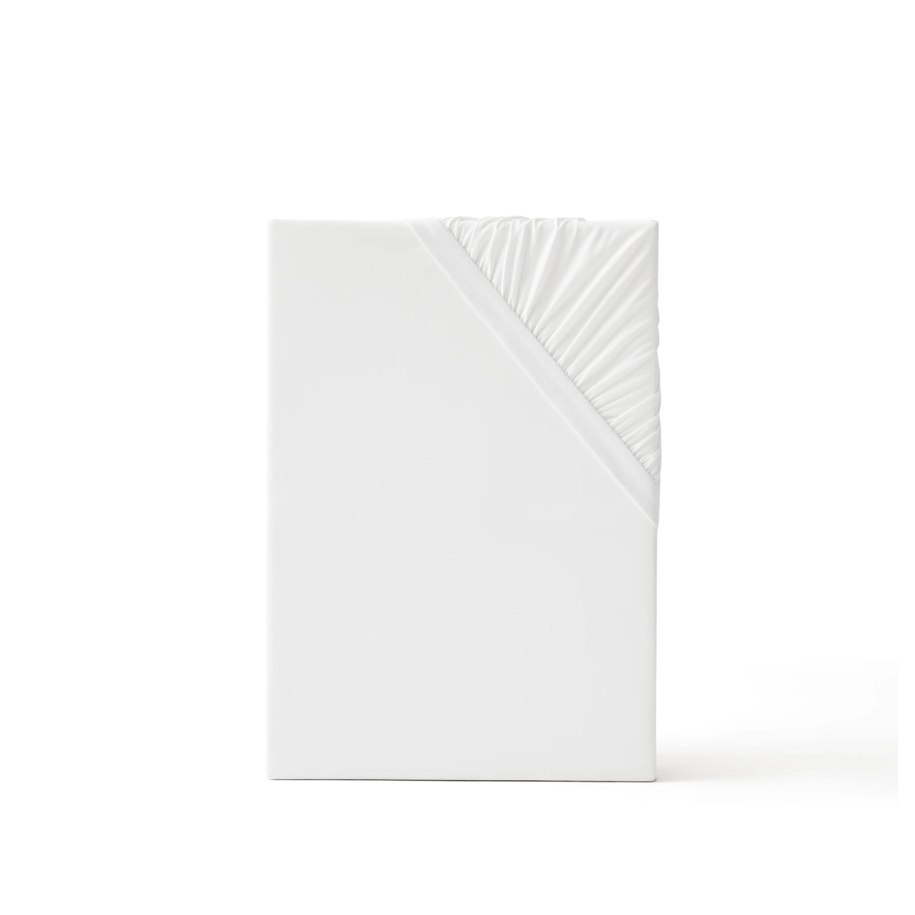 White cooling fitted sheet featuring elasticized edge for secure fit.