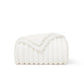 GentleSoft white polyester blanket folded, showing ribbed texture and scalloped edge. Cozy, soft, and lint-free.