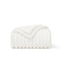 GentleSoft white polyester blanket folded, showing ribbed texture and scalloped edge. Cozy, soft, and lint-free.